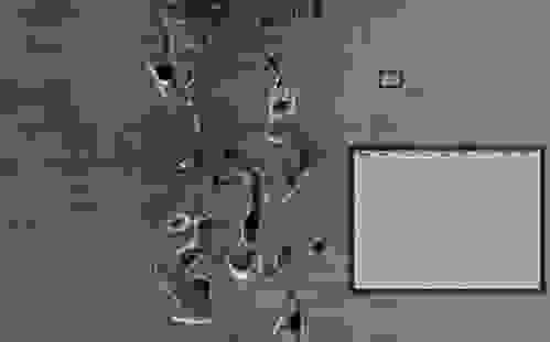 Displacement-controlled indentation matrix obtained after performing mechanical microscopy on a metallurgical sample