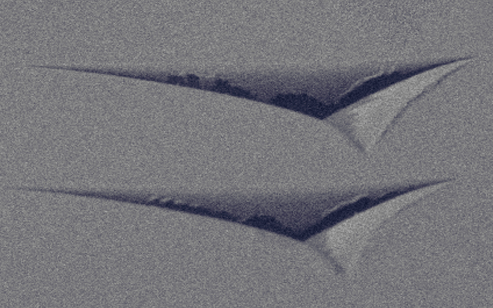 <p>SEM image of Berkovich indentations revealing mechanical properties of a material via nanoindentation.</p>