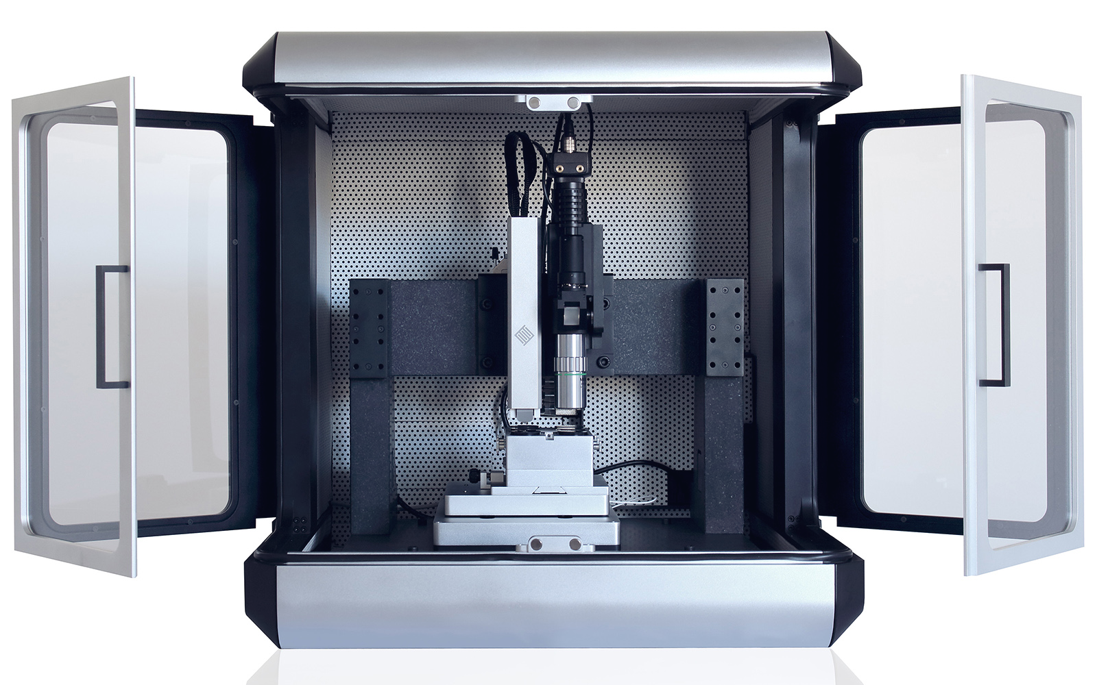 <p>i04 Femto-Indenter, a standalone MEMS-based nanoindenter for material property analysis, with open doors.</p>